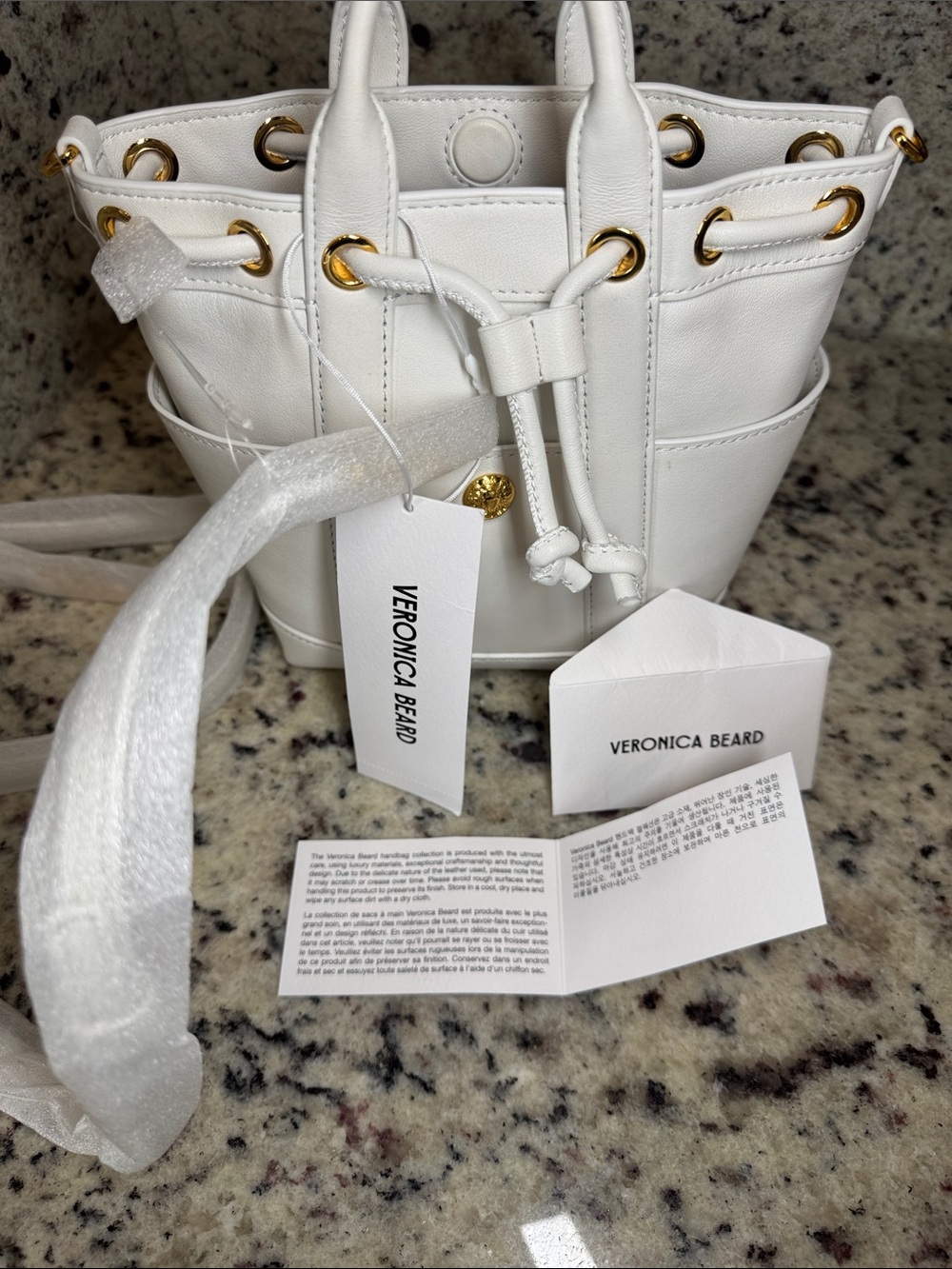 Veronica Beard “Mini Goody Bag” White Leather Drawstring Crossbody Bucket Bag. - Picture 13 of 16